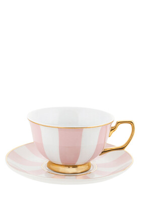 فنجان شاي وطبق بلون وردي
